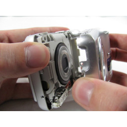 Снятие Olympus FE-210 переднего кожуха